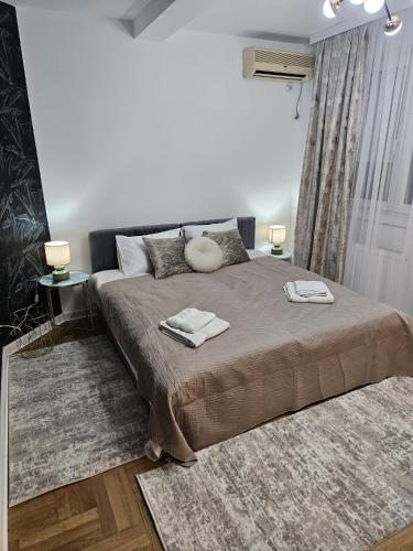 Ένα ή περισσότερα κρεβάτια σε δωμάτιο στο Apartman Florida