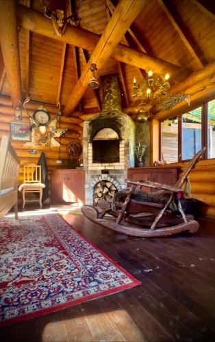 Χώρος καθιστικού στο Cottage PolyaNitsa окремий котедж з каміном