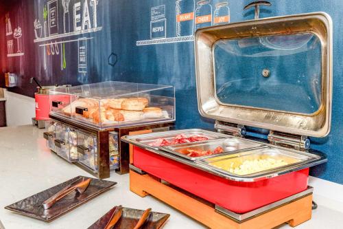 a food cart with bread and pastries in a store at Hampton Inn & Suites Fort Worth-West-I-30 in Fort Worth