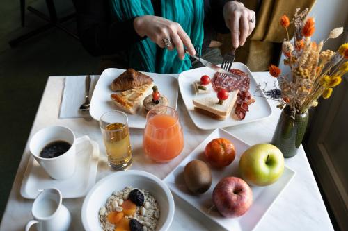 Opțiuni de mic dejun disponibile oaspeților de la Hôtel Escurial - Centre Gare