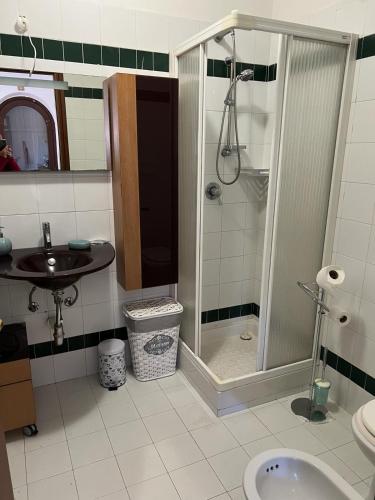 a bathroom with a shower and a sink at Casa Elena in Manciano