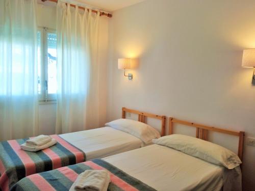 Postel nebo postele na pokoji v ubytování Apartamento Alessia Garden