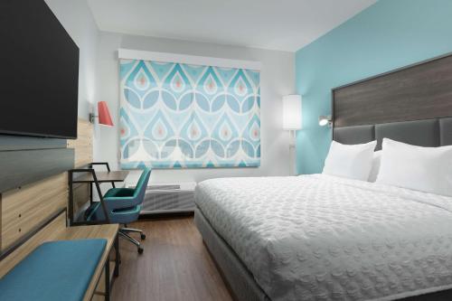 Giường trong phòng chung tại Tru By Hilton North Augusta