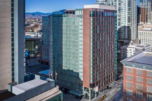 an aerial view of a tall building in a city at Le Méridien Denver Downtown in Denver