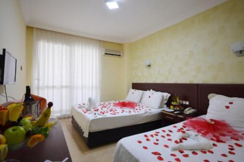 Cama o camas de una habitación en ADMİRAL HOTEL