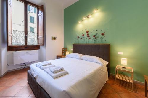 Llit o llits en una habitació de Gaddi by Mmega