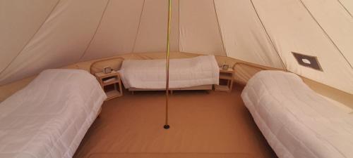 Postel nebo postele na pokoji v ubytování Sabático Glamping