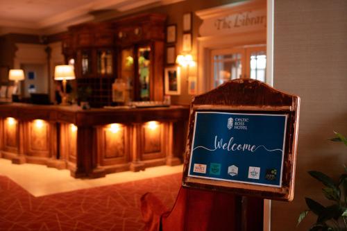 a sign in front of a bar in a room at Celtic Ross Hotel & Leisure Centre in Rosscarbery