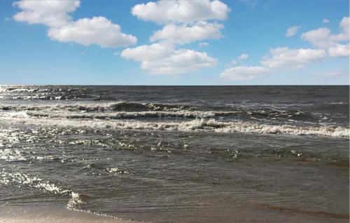 a view of the ocean from the beach at Lovely Home In Nybrostrand With Sauna in Glemminge