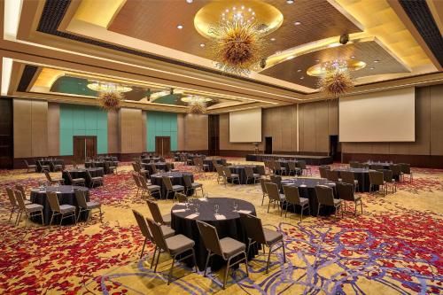 a banquet hall with tables and chairs in a room at The Westin Kuala Lumpur in Kuala Lumpur