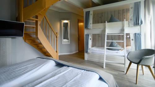 Postel nebo postele na pokoji v ubytování Hotel Am Medemufer