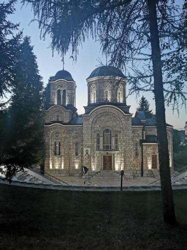 a large stone building with two domes on top at Apartmani Iva in Banja Koviljača