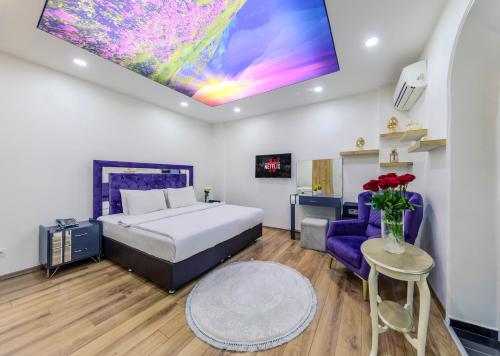 Ένα ή περισσότερα κρεβάτια σε δωμάτιο στο Sisli Form Hotel