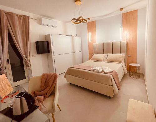 Ένα ή περισσότερα κρεβάτια σε δωμάτιο στο Elegance Paema