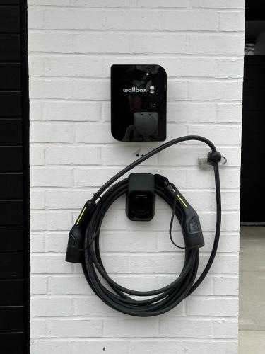 a camera is hooked up to a wall at Sakura Lodging in Bossut-Gottechain