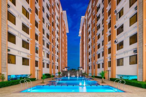 a view of the courtyard of an apartment building at Paseo Verde Condominium in Manila