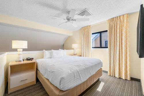 a hotel room with a bed and a window at Avia Residences on Savoy - Extended Stay in Atlanta