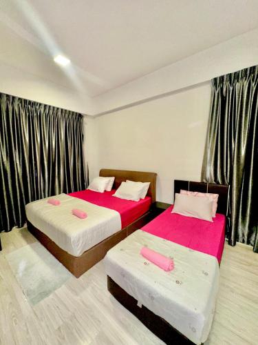 Postel nebo postele na pokoji v ubytování Sutera Luxurious Loft 1