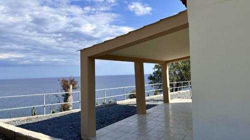 a view of the ocean from a house at Sfinias Apartments in Kali Limenes
