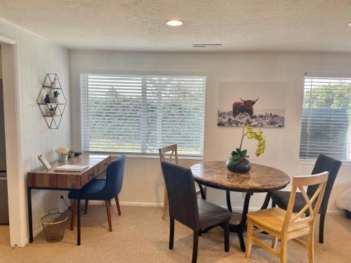 a dining room with a table and chairs at City light views getaway close to top ski resorts in Salt Lake City