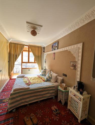 Cama o camas de una habitación en Riad Dar Omar