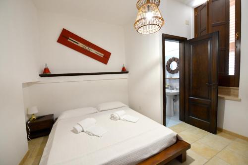 Ένα ή περισσότερα κρεβάτια σε δωμάτιο στο B&B Masseria Piccola