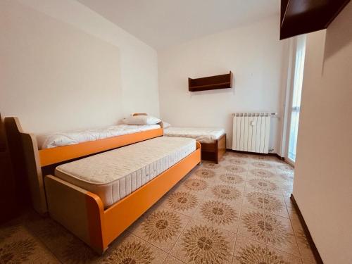 מיטה או מיטות בחדר ב-Ranco Lake Sunshine Apartment