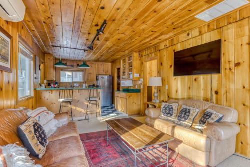 a living room with a couch and a table at Sno-Bird #10 in Government Camp