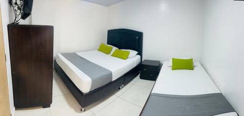 Ένα ή περισσότερα κρεβάτια σε δωμάτιο στο Casa Magi