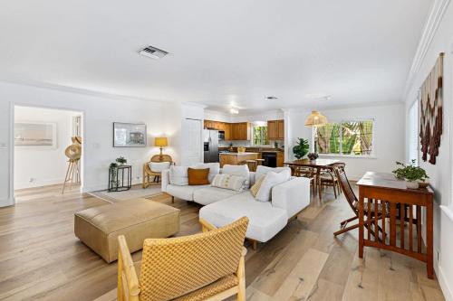 a living room with a couch and a table at Spacious Beach Apt in Las Olas Blvd in Fort Lauderdale