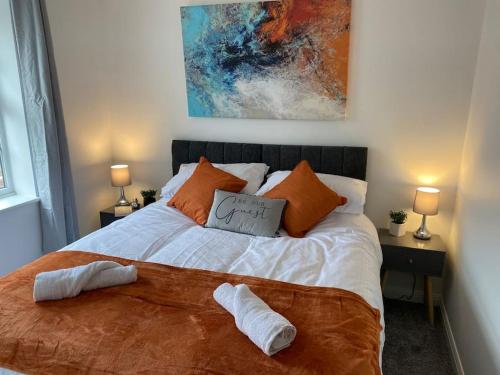 Ένα ή περισσότερα κρεβάτια σε δωμάτιο στο Charming 3-Bedroom Norwich Retreat Garden& Parking