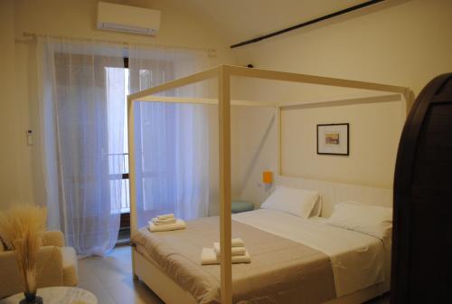 En eller flere senge i et værelse på Dreaming Mazzanti 11