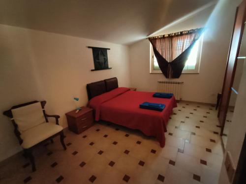 Säng eller sängar i ett rum på Casa vacanze Medau Rubiu