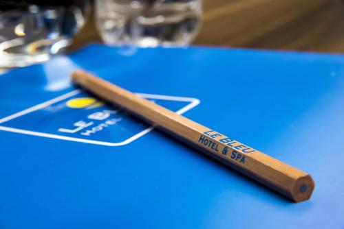a wooden baseball bat sitting on top of a table at Le Bleu Hotel & Resort Kusadasi in Kusadası