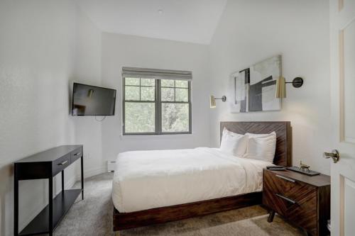 Ένα ή περισσότερα κρεβάτια σε δωμάτιο στο Lodge at Brookside