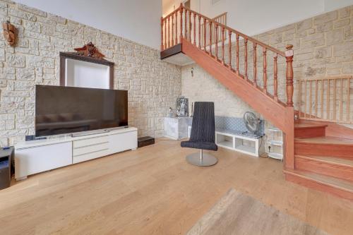 Photo de la galerie de l'établissement Duplex apartment with parking, à Sannois