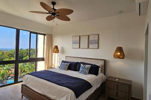 Ένα ή περισσότερα κρεβάτια σε δωμάτιο στο 2 BR Ocean view apt playa bonita