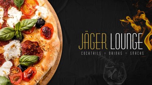 a pizza sitting on top of a wooden cutting board at ROOMS FOR ADULTS ONLY - Hotel Jägerhof Wörthersee in Krumpendorf am Wörthersee