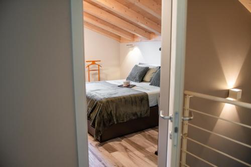 a bedroom with a bed in a room at Monte Moro Gavi B&B in Gavi