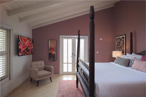 Cama o camas de una habitación en Kura Botanica Hotel