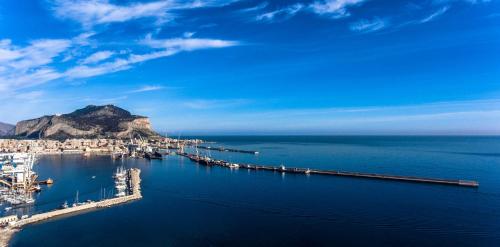 an aerial view of a dock in the water at Ducrot Apartment in Palermo