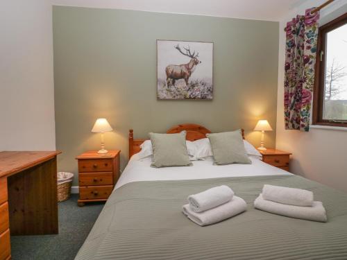 Ένα ή περισσότερα κρεβάτια σε δωμάτιο στο Winder Ghyll