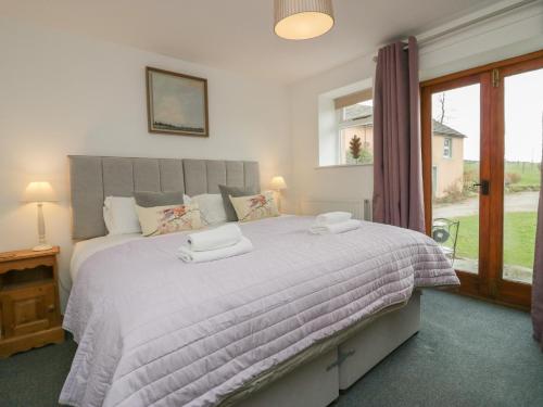 Postel nebo postele na pokoji v ubytování Winder Green