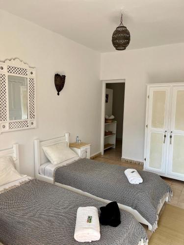 Postel nebo postele na pokoji v ubytování La Courbine d'Argent
