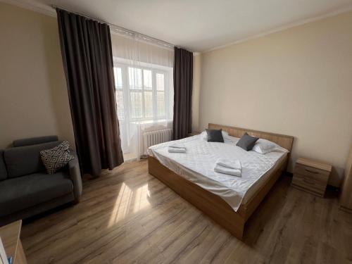 Кровать или кровати в номере Belon inn