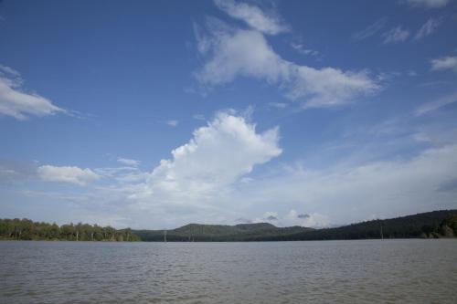 a view of a large body of water at Waterwoods Lodge Kabini in Begūr