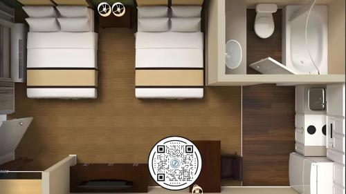 a floor plan of a room with two beds at Extended Stay America Suites - Columbia - West - Interstate 126 in Columbia