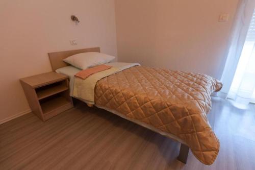 Lova arba lovos apgyvendinimo įstaigoje Hotel Ivanković
