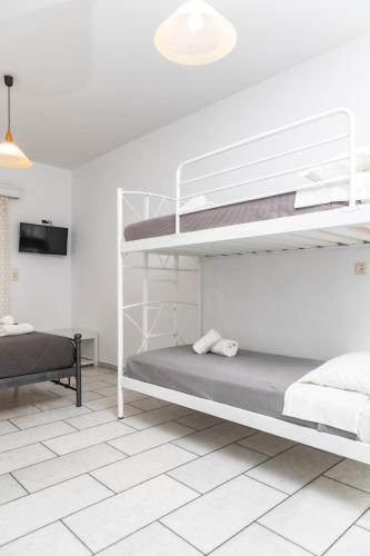 Postel nebo postele na pokoji v ubytování Depis studios & apartments