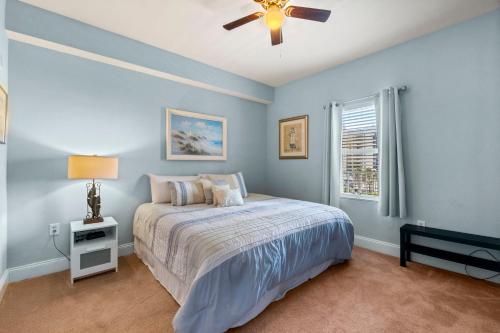 A bed or beds in a room at Laketown Wharf #320 by Nautical Properties